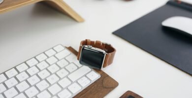silver aluminum case Apple Watch on Apple Magic keyboard